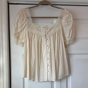Elegant Cream Lace-Trimmed Reformation Top